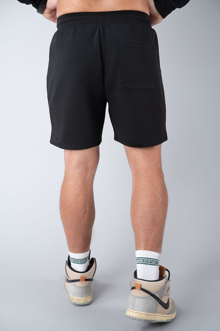 Men core shorts black, back view